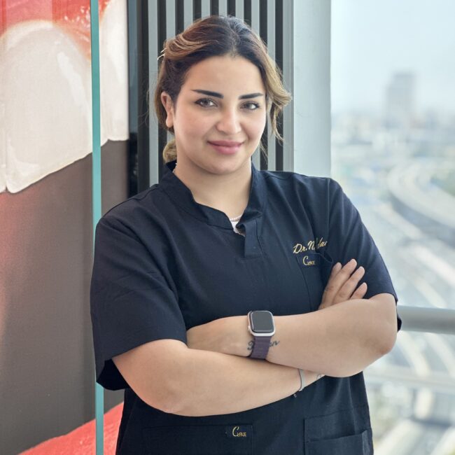 Dr. Nada, renowned cosmetic and aesthetic dentist at The MediTrust in Dubai, providing exceptional dental care and advanced cosmetic procedures for radiant smiles.